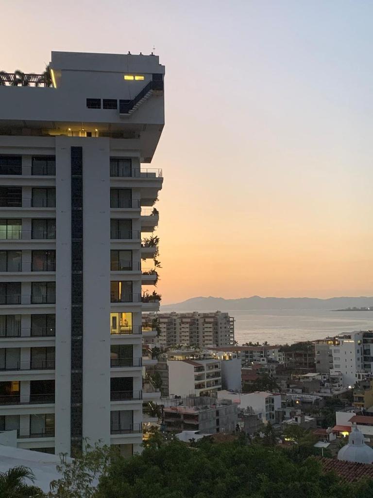 Puerto Vallarta condo building with ocean and sunset views
